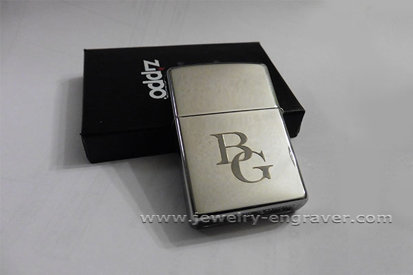 #335 - Hand engraving initials on a Zippo.