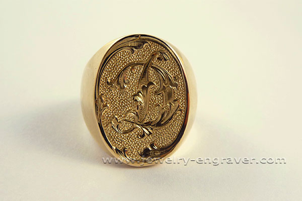 #308 - Hand engraved Monogram on a Signet ring.